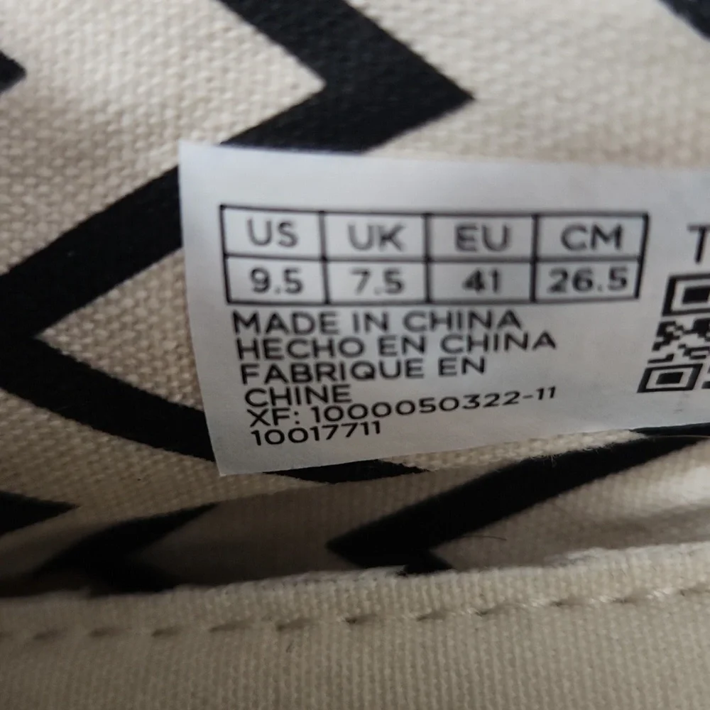 TOMS Shoes Size 9.5 Cream Canvas Slip-On has spots flaws